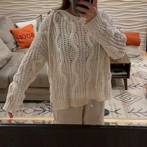 Oversized knit sweater with hood